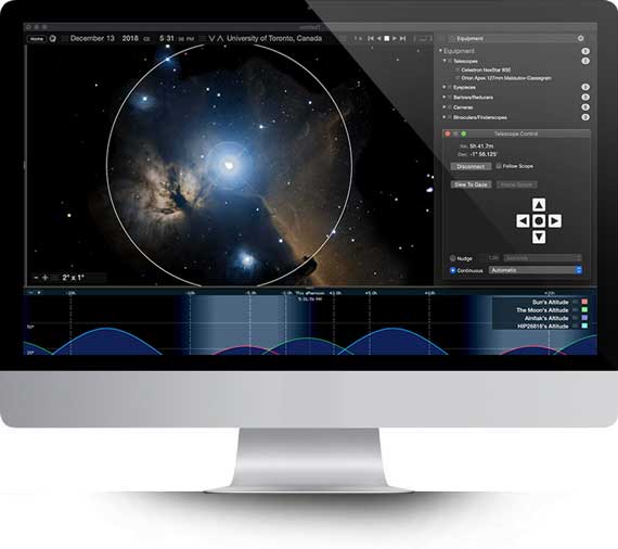 Apple iMac running Starry Night Middle School software showing a planet Saturn simulation